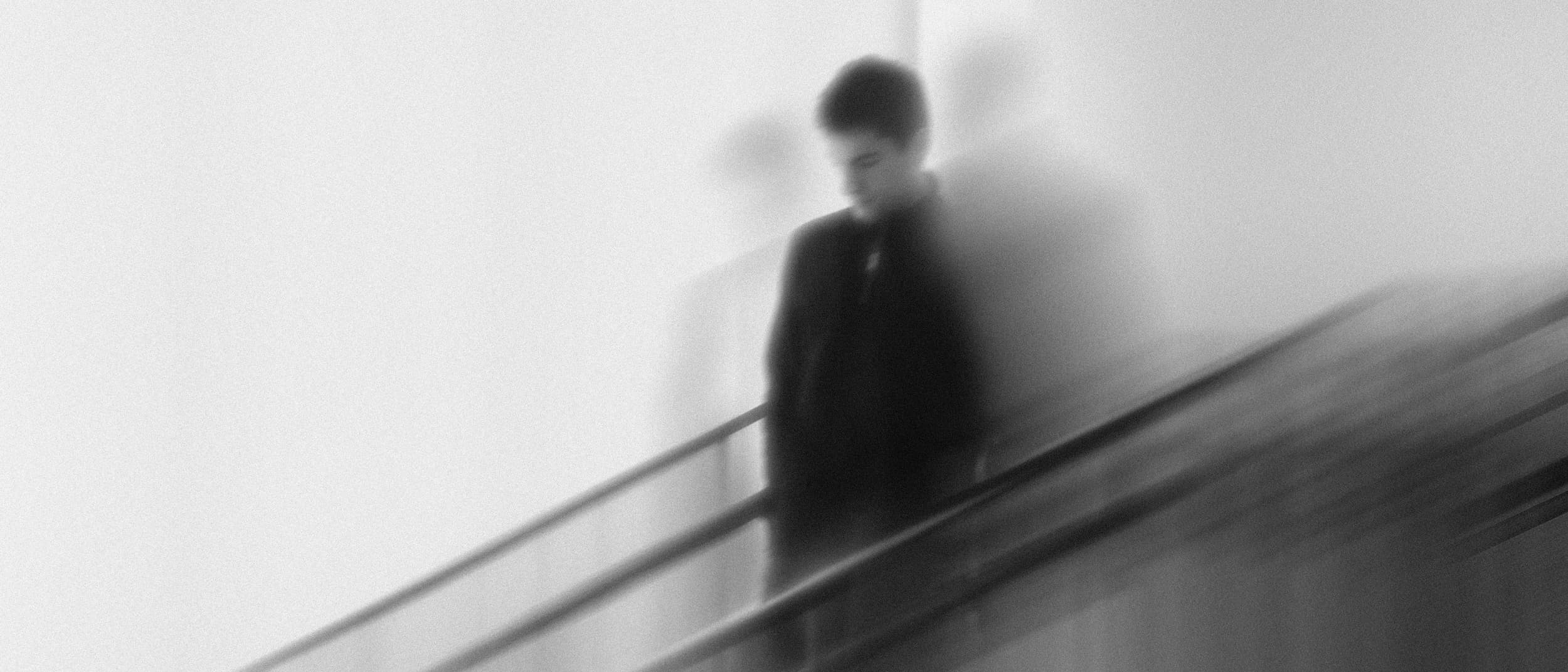 this is an image of a person in black and white and motion blur has been used