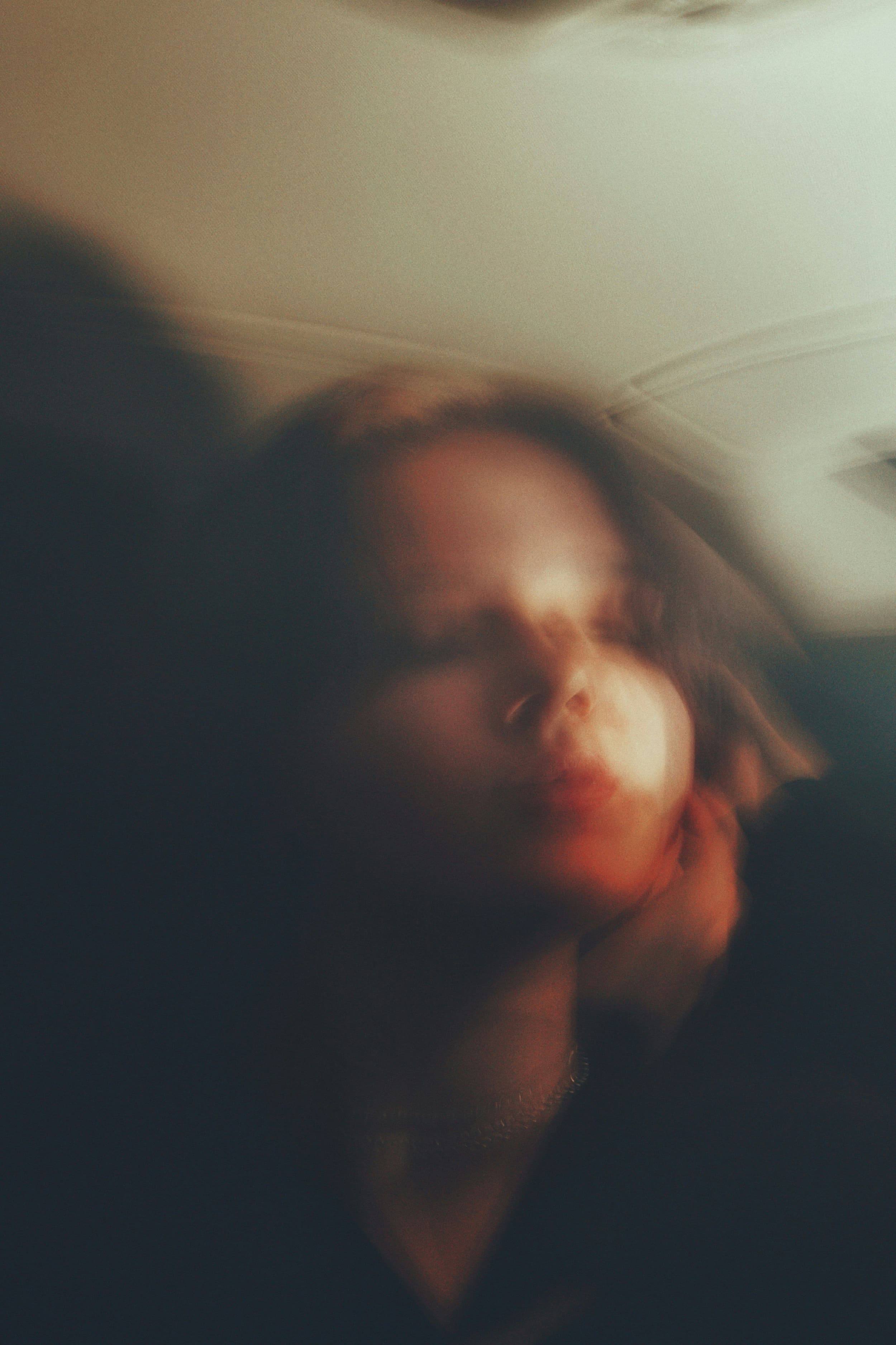this is an image of a face in motion blur